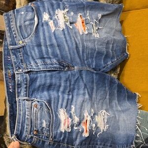 Mens distressed american eagle jean shorts w/ colourful bandana patches and rips